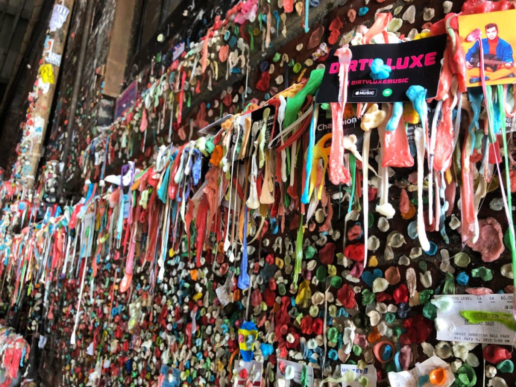 Close-up of chewing gum and items stuck on the Seattle Gum Wall