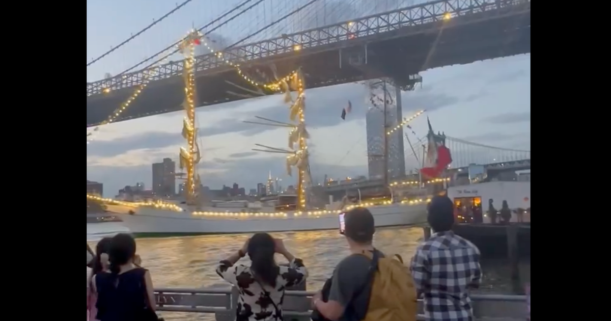 The ARM Cuauhtémoc, a large Mexican Navy training ship, shown near the Brooklyn Bridge after the Brooklyn Bridge accident on May 17, 2025, with its masts appearing damaged or lowered.