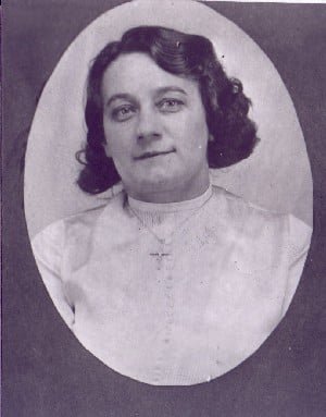 A portrait in an oval frame shows Anna Maria Zwanziger, known as "The German Poisoner." She has dark, wavy hair and wears a light-colored top with a small cross necklace.