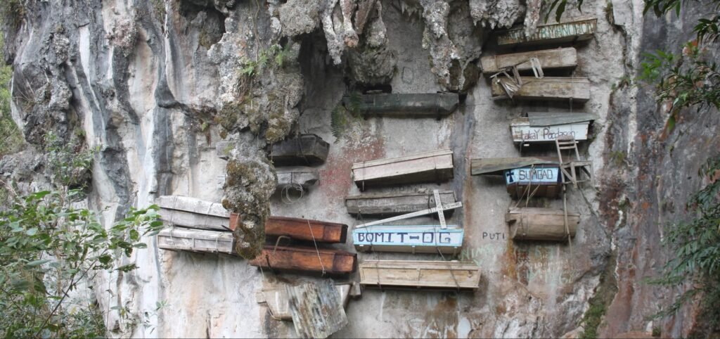 Sagada hanging coffins displayed on a cliff face, representing the Igorot burial tradition in the Philippines’ mountainous region.