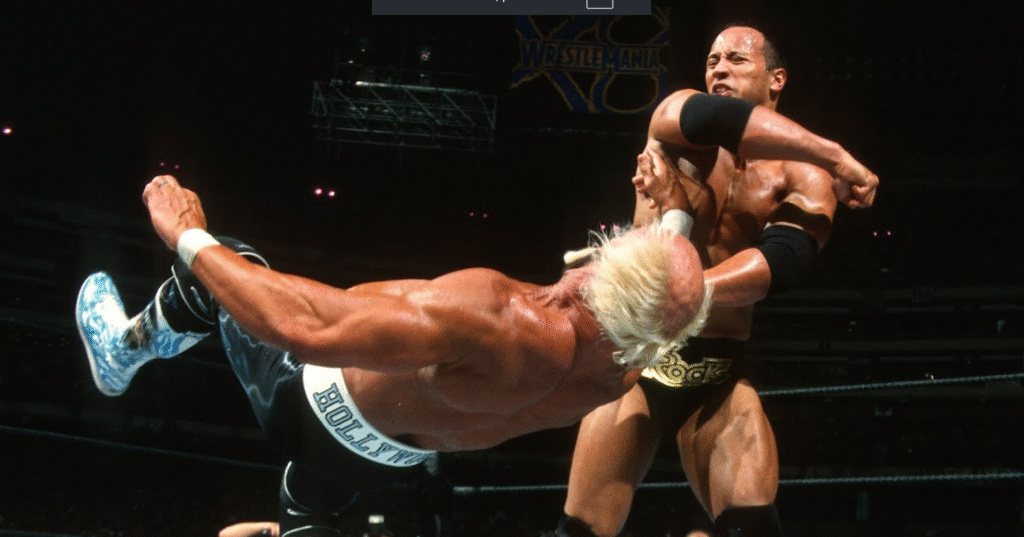 The Rock delivers his signature move, the Rock Bottom, to Hollywood Hulk Hogan during their iconic "Icon vs. Icon" match at WrestleMania X8.