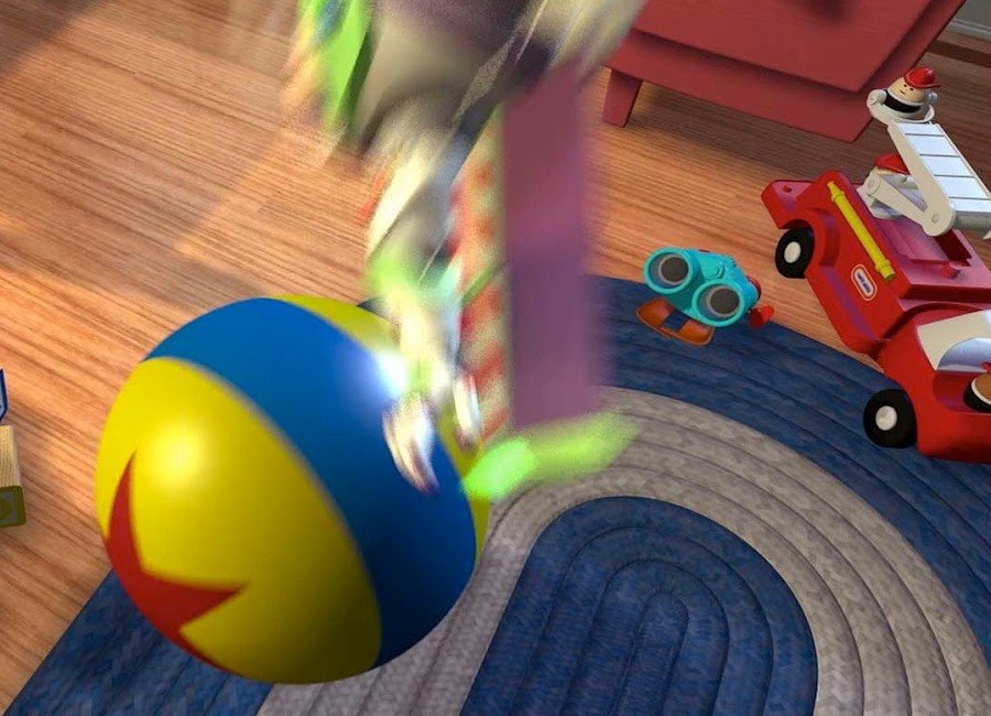 Buzz Lightyear bouncing on the iconic Pixar Luxo Ball in Andy’s room from Toy Story.